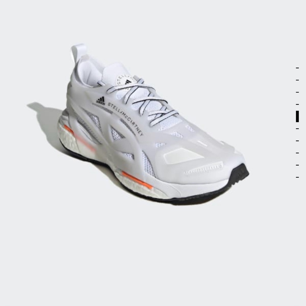 Size 8.5 men’s STELLA MCCARTNEY ADIDAS. White with orange. NIB